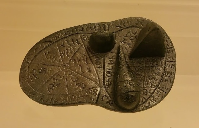 A bronze model of a sheep's liver from Piacenza, 120-80 BCE, used to train Etruscan priests for divination. The liver is divided into 40 sections with inscriptions naming 24 gods. CC Jan van der Crabben