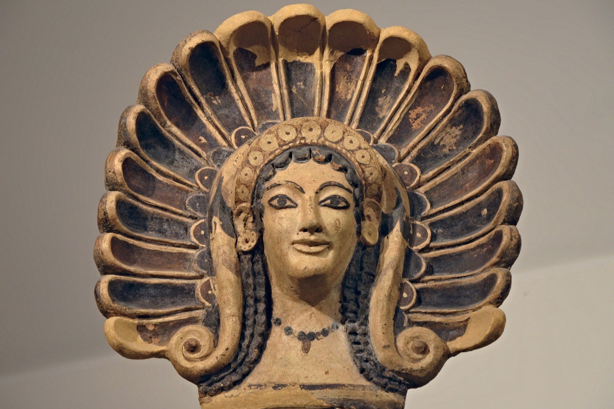 An adorned terminal roof tile resembling a maenad, originating from the Etruscan Portonaccio Temple at Veii in central Italy, dating back to 510 BCE. CC Carole Raddato